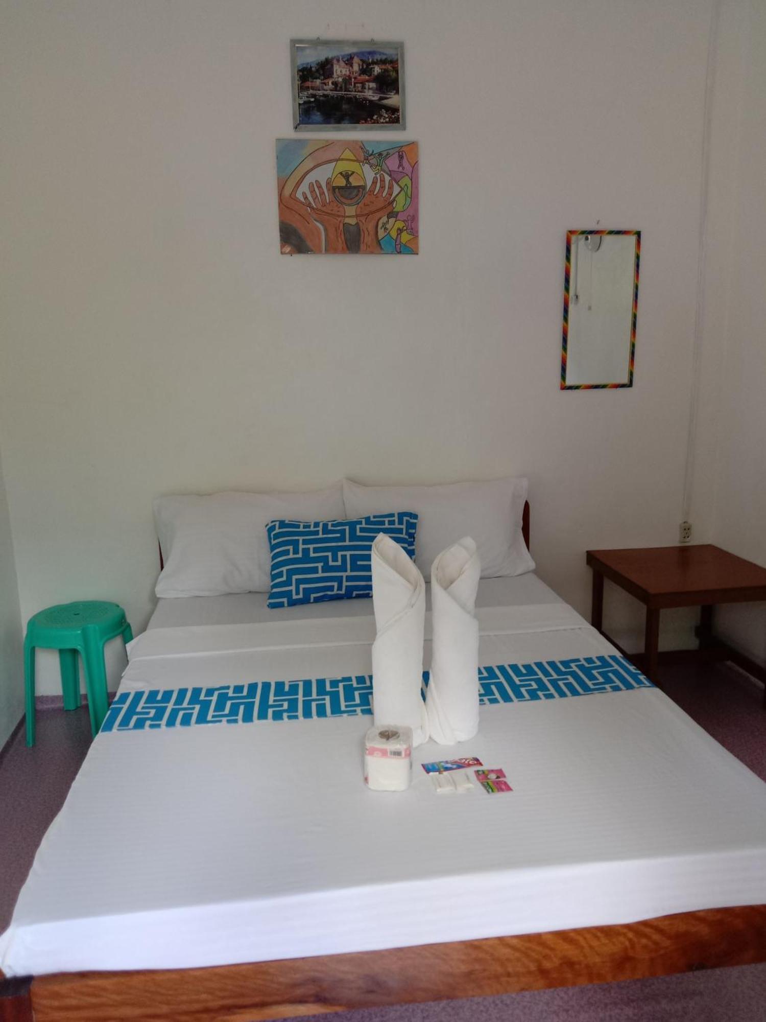 Bucana Beachfront Guesthouse El Nido Værelse billede